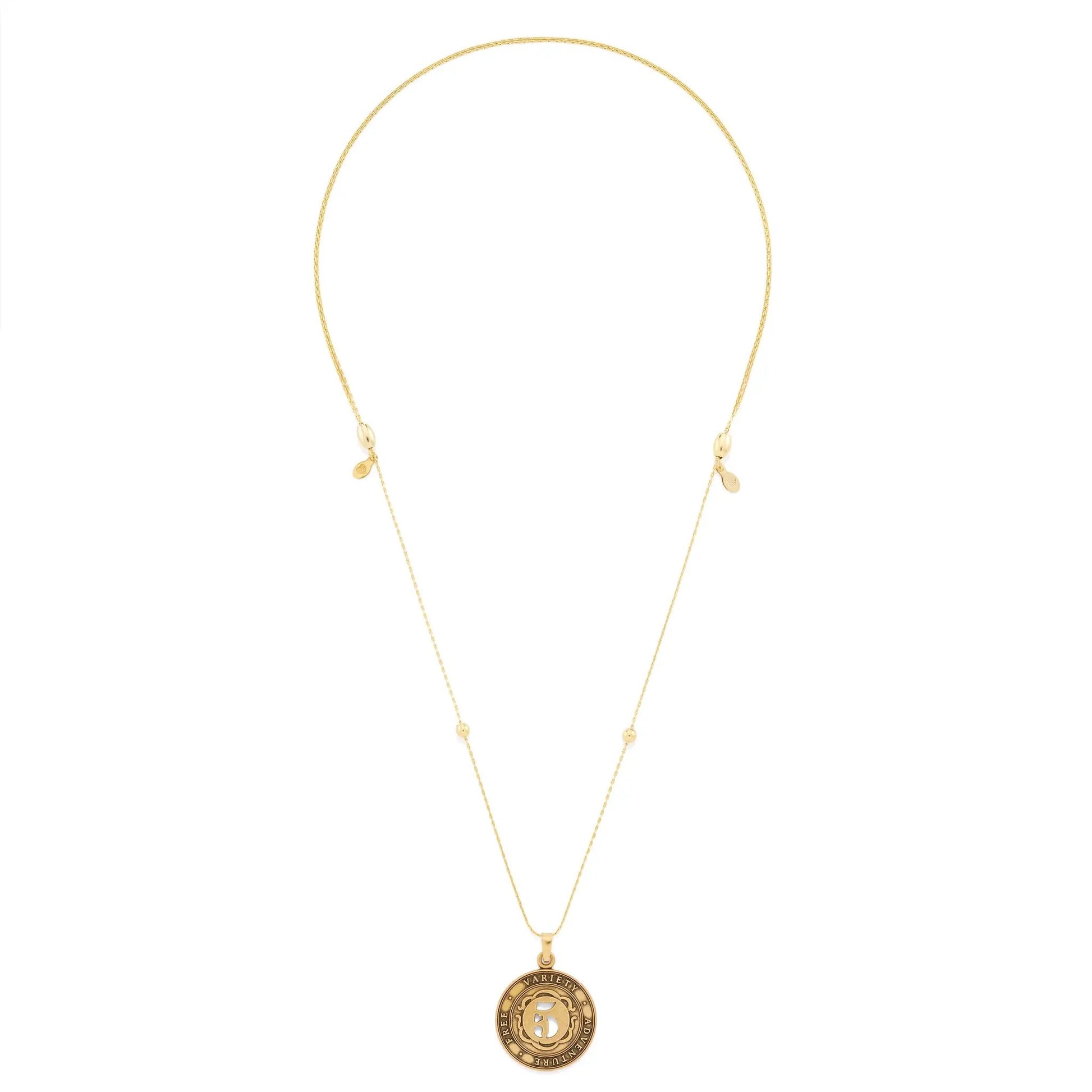 Number 5 Necklace, Expandable gold-tone chain with circular pendant featuring a 5 motif on Tampa Home & Garden Store