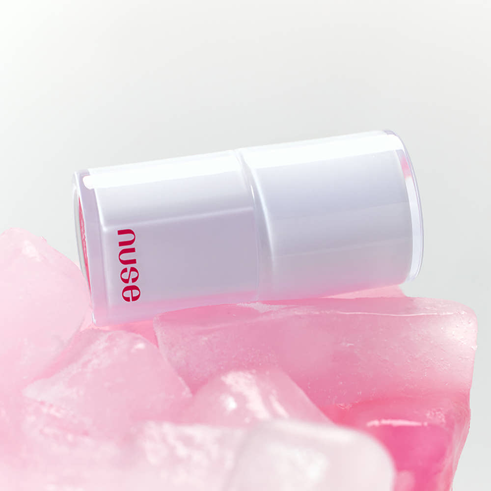 lip tint Seoulia Nuse Care Liptual 4.5g tube with lavender cap atop pink ice on Tampa Home & Garden Store