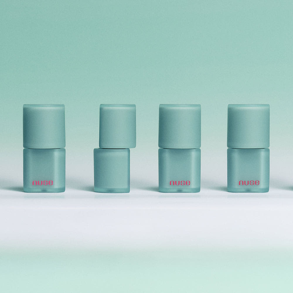 LIP TINT nuse Mousse Liptual 4.5g Seoulia, 4 teal bottles with pink nuse logo on Tampa Home & Garden Store