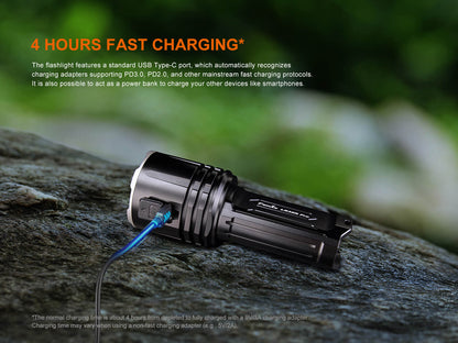 Fenix LR35R PRO handheld searchlight with black aluminum body and blue USB-C charging cable on Tampa Home & Garden Store