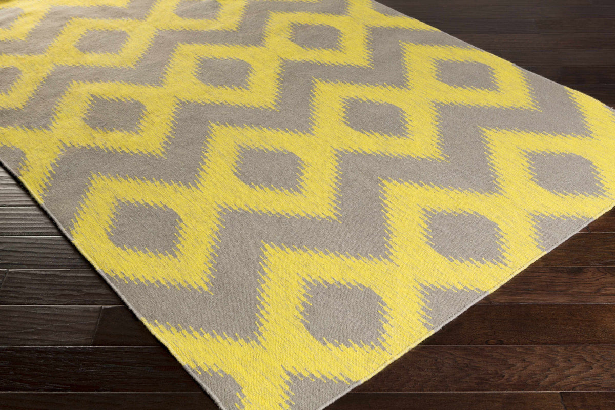 Oradell Yellow Ikat Wool Rug by Boutique Rugs gray and yellow geometric pattern on Tampa Home & Garden Store