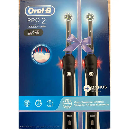 Oral-B Pro 2 Black Edition rechargeable toothbrush with two handles and bonus handle on Tampa Home & Garden Store
