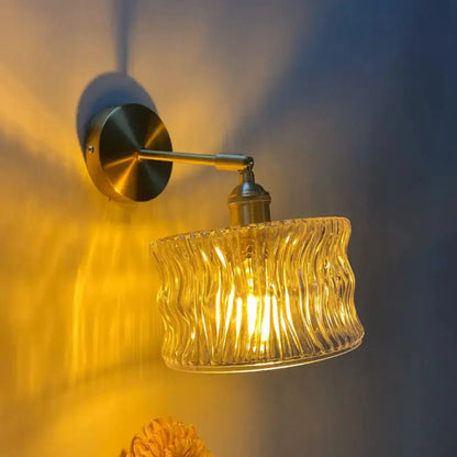 Orange and Gold Fluted Glass Wall Lamp in Bedroom