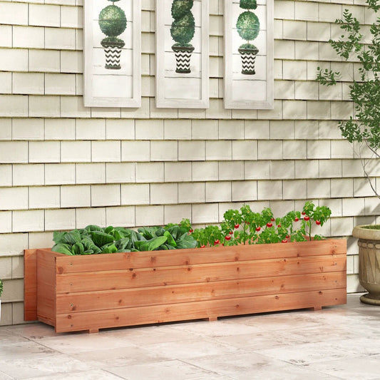 Fir wood orange planter box with drainage holes, filled with leafy greens on a patio on Tampa Home & Garden Store