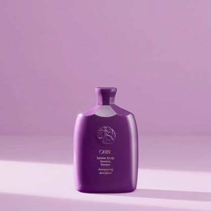 Oribe Serene Scalp Densifying Shampoo bottle in glossy purple with crest emblem on Tampa Home & Garden Store