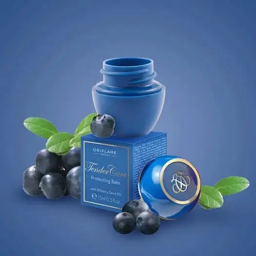 Tender Care Protecting Balm by Oriflame in blue jar beside the box with blueberries on Tampa Home & Garden Store