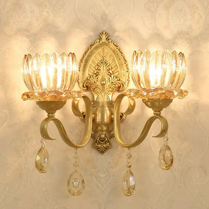 Brass Lotus Wall Sconce by Decorbites with twin crystal cups and hanging prisms on Tampa Home & Garden Store