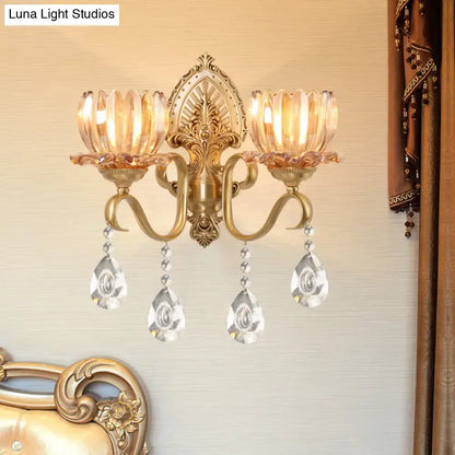 Brass Lotus Wall Sconce by Decorbites, gold finish with crystal drops and two candle lights on Tampa Home & Garden Store