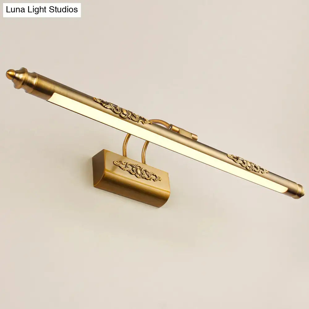 Brass wall vanity light by Decorbites with ornate scroll detailing, wall-mounted fixture on Tampa Home & Garden Store
