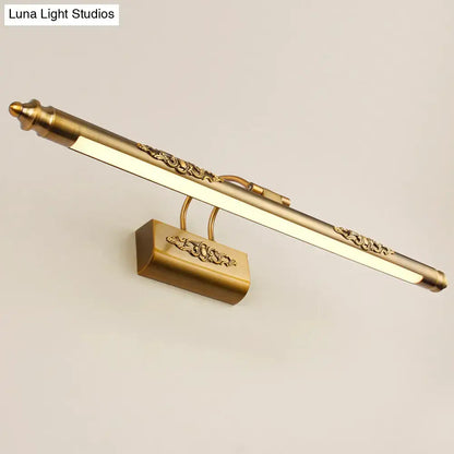 Brass wall vanity light by Decorbites with ornate scroll detailing, wall-mounted fixture on Tampa Home & Garden Store