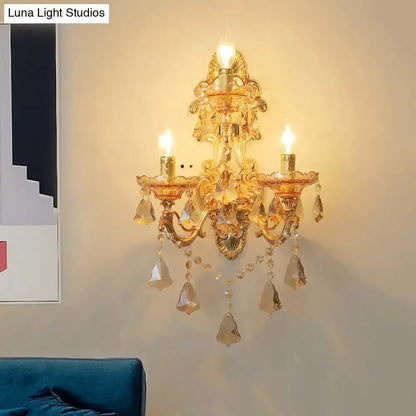 Ornate gold crystal 3-light wall sconce with hanging prisms by Decorbites on Tampa Home & Garden Store