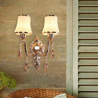 Gold crystal brass 14-inch wall sconce with dual arms and crystal drops by Decorbites on Tampa Home & Garden Store