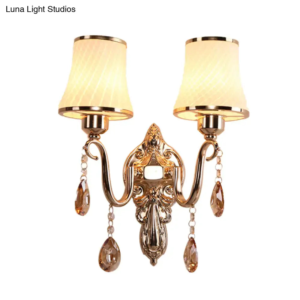 Gold crystal brass 14-inch wall sconce by Decorbites with dual lamps and hanging crystals on Tampa Home & Garden Store