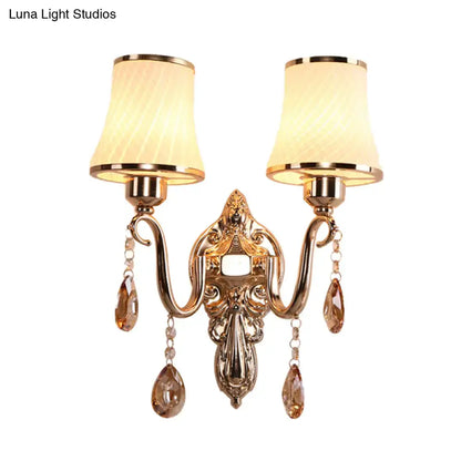Gold crystal brass 14-inch wall sconce by Decorbites with dual lamps and hanging crystals on Tampa Home & Garden Store