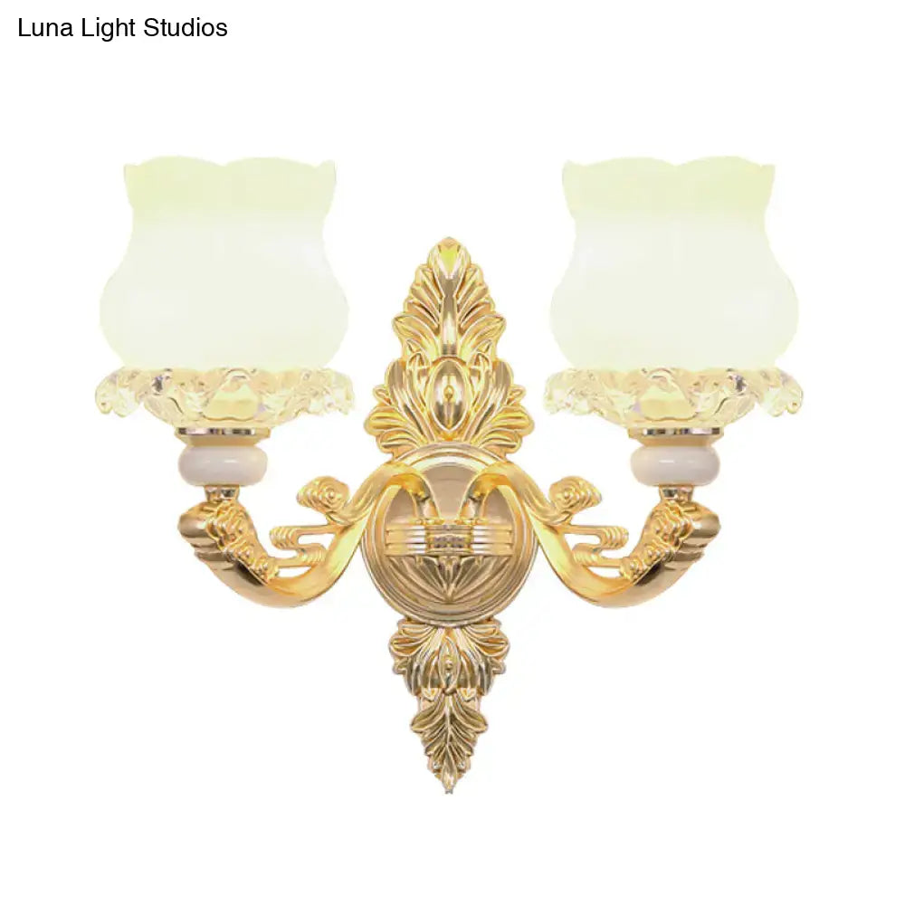 Gold glass bloom wall light sconce with two ornate arms and frosted tulip shades, Decorbites on Tampa Home & Garden Store
