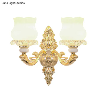 Gold glass bloom wall light sconce with two ornate arms and frosted tulip shades, Decorbites on Tampa Home & Garden Store