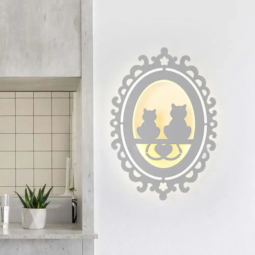 Gray cat wall light by Decorbites with a framed two-cat silhouette and warm glow on Tampa Home & Garden Store