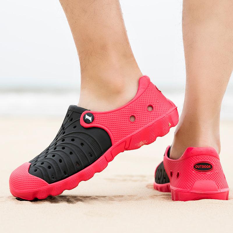 Outdoor Stevvex sandals pair black pink quick-dry rubber clogs on beach on Tampa Home & Garden Store