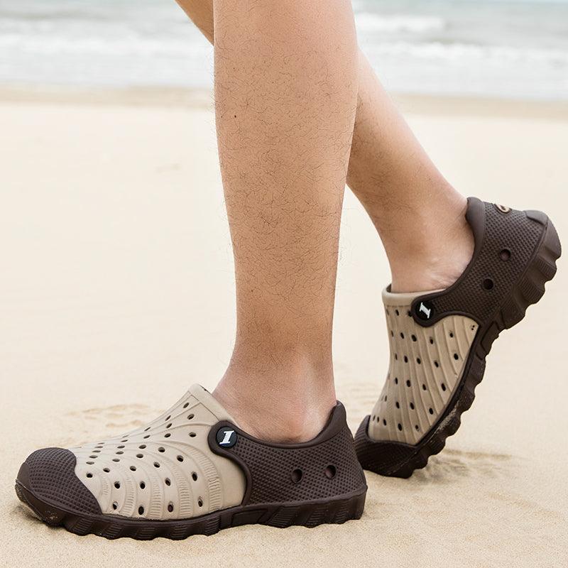 Stevvex outdoor men's sandals beige brown perforated rubber clogs pair on sandy beach on Tampa Home & Garden Store