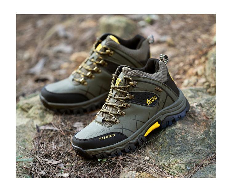 Stevvex men's olive-green hiking boots pair with black toe cap and yellow accents, outsole on Tampa Home & Garden Store