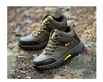 Stevvex men's olive-green hiking boots pair with black toe cap and yellow accents, outsole on Tampa Home & Garden Store