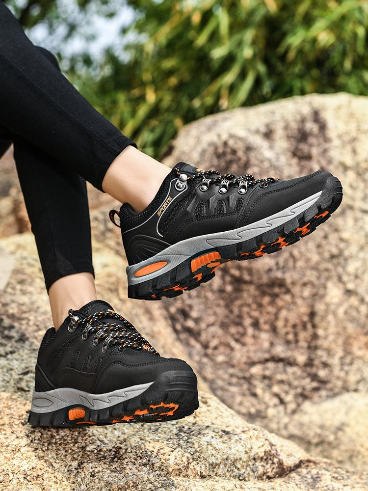 Stevvex men's outdoor waterproof hiking boots pair black with orange rugged outsole on Tampa Home & Garden Store