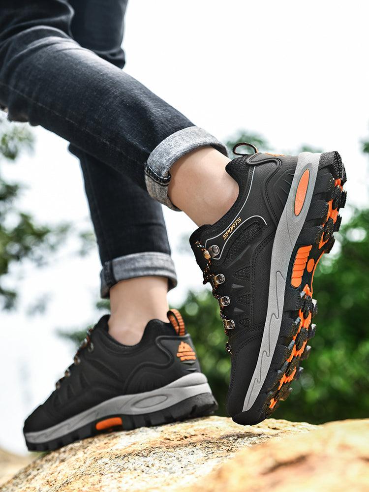 Stevvex men's waterproof hiking boots black with orange accents, rugged lug sole for hiking on Tampa Home & Garden Store