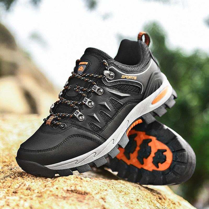 Stevvex outdoor waterproof hiking boot black with orange accents and rugged sole on Tampa Home & Garden Store