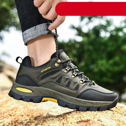 Stevvex men's hiking boots with olive-gray upper, rugged sole and yellow accents on Tampa Home & Garden Store