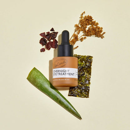 UpCircle Overnight Eye Treatment Retinol Exosomes eye cream bottle with dropper amid botanicals on Tampa Home & Garden Store