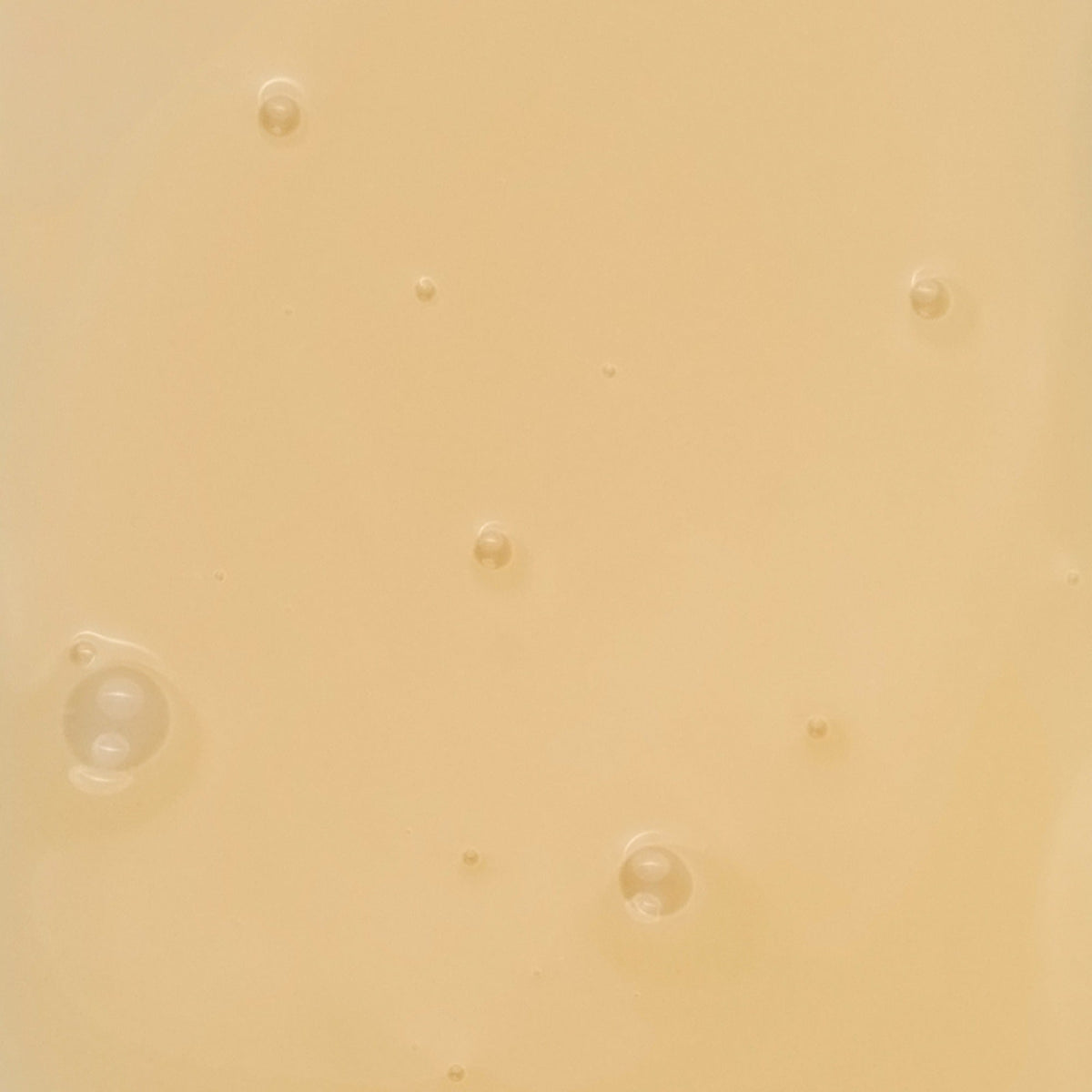UpCircle Overnight Eye Treatment with Retinol Exosomes eye cream droplets on beige surface on Tampa Home & Garden Store