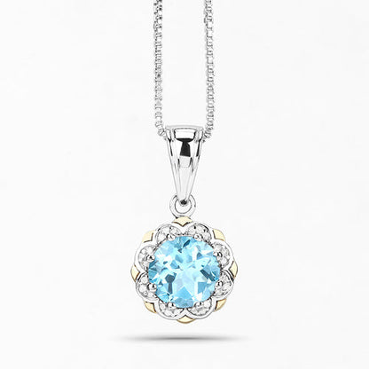 Pendant with 2.32ct blue topaz, diamonds, 14K yellow gold over .925 silver on silver chain on Tampa Home & Garden Store