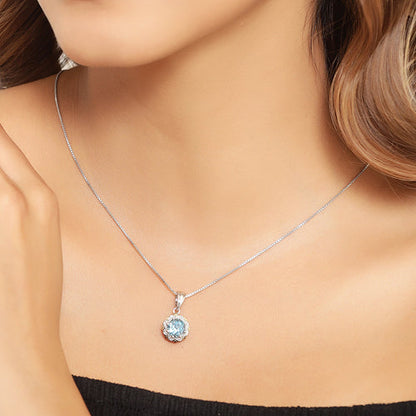 Pendant necklace featuring 2.32ct Swiss blue topaz with white diamond halo on silver chain on Tampa Home & Garden Store