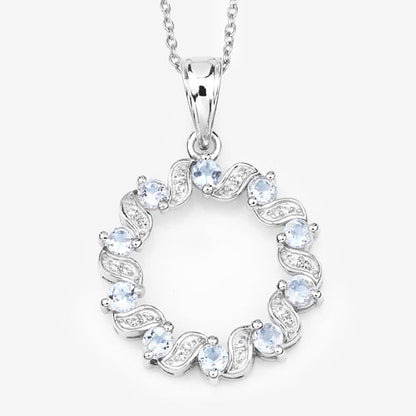 Pendant .925 sterling silver by Bids.com with 1.10ct aquamarine and white topaz circle on Tampa Home & Garden Store