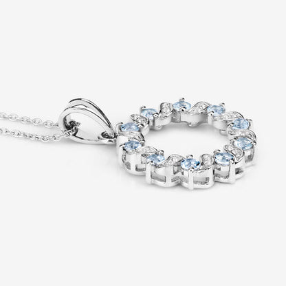 Pendant: circular halo in sterling silver with 1.10ct aquamarine and white topaz, Bids.com on Tampa Home & Garden Store