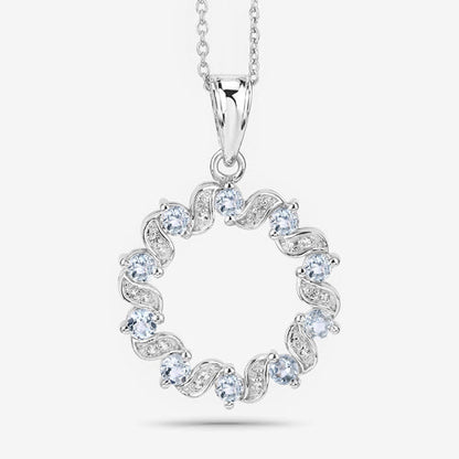 1.10 Carat Aquamarine and White Topaz Sterling Silver Pendant, circular halo of alternating stones on Tampa Home & Garden Store