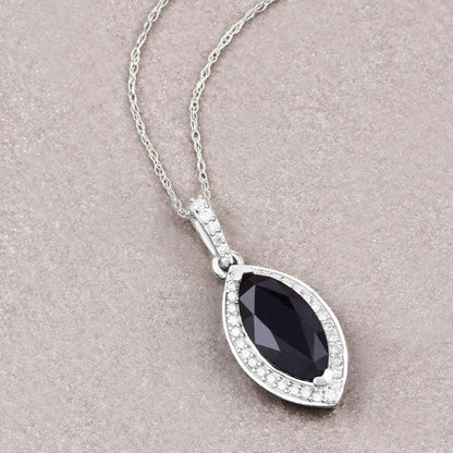 2.27ct blue sapphire pendant with diamond halo in 10K white gold on a silver chain on Tampa Home & Garden Store