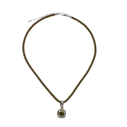 Vintage pendant necklace by Lauren G Adams with lattice frame and green gemstone on cord on Tampa Home & Garden Store