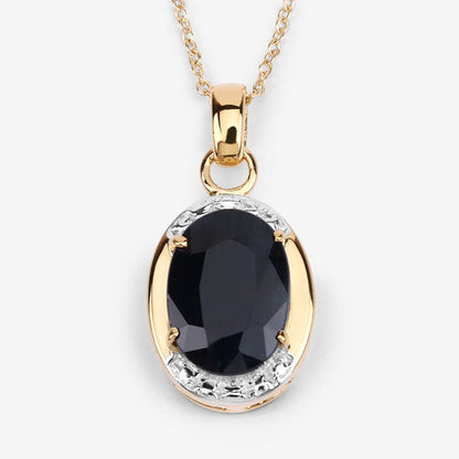 Oval 7.50ct black sapphire pendant in a gold-tone setting with a white halo on a gold chain on Tampa Home & Garden Store