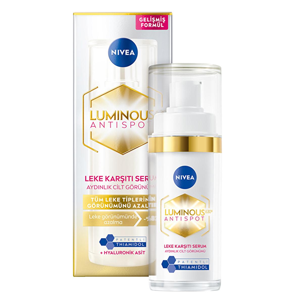 Face serum bottle and box, NIVEA Luminous Antispot with blue logo, gold hex emblem, white pump on Tampa Home & Garden Store