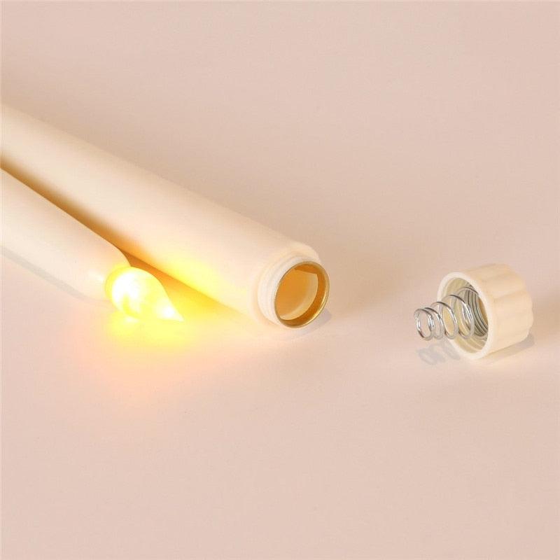 Flameless 12-pack yellow taper candles by Stevvex with remote on Tampa Home & Garden Store
