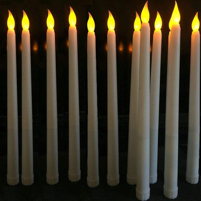 12-pack white plastic flameless LED taper candles with warm flickering yellow flames on Tampa Home & Garden Store