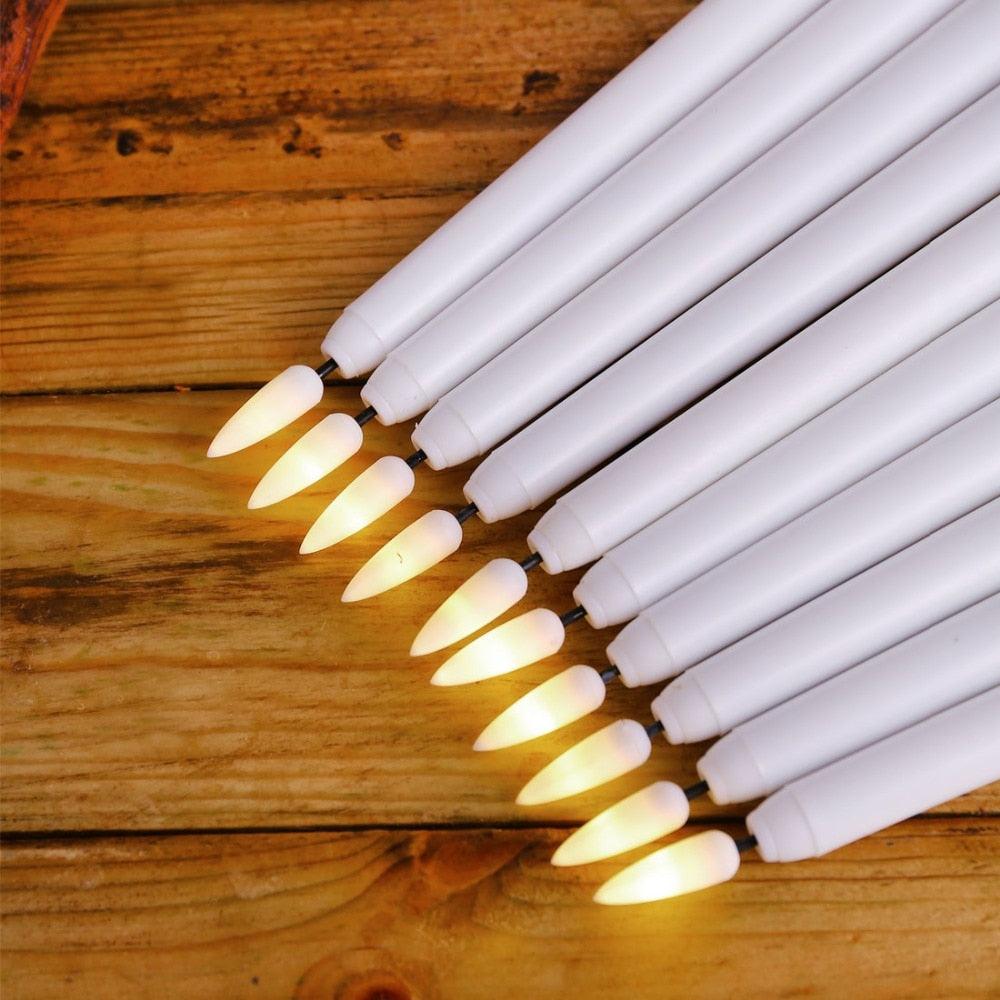 Stevvex flameless LED taper candles, 12-pack ivory plastic with warm flicker on Tampa Home & Garden Store