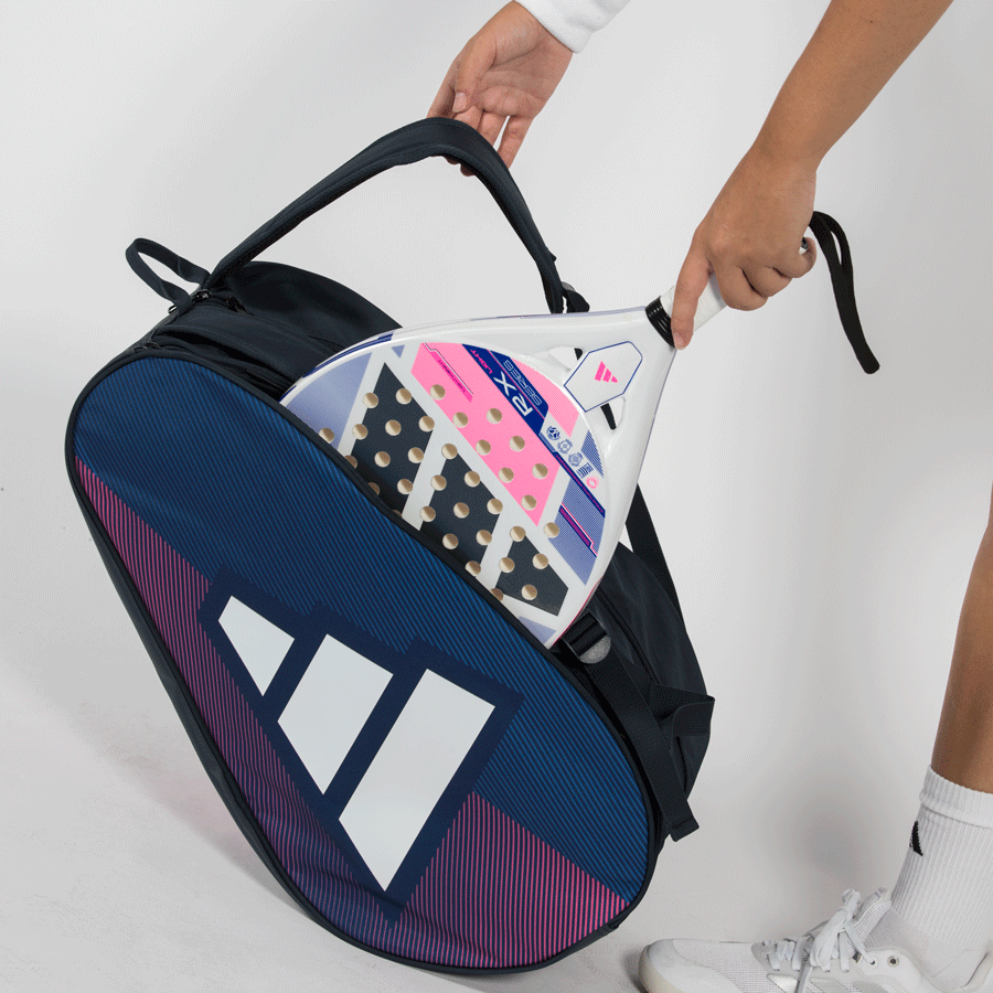 Adidas Padel Racket Bag Control 26 blue and black bag with white logo inserting a colorful racket on Tampa Home & Garden Store