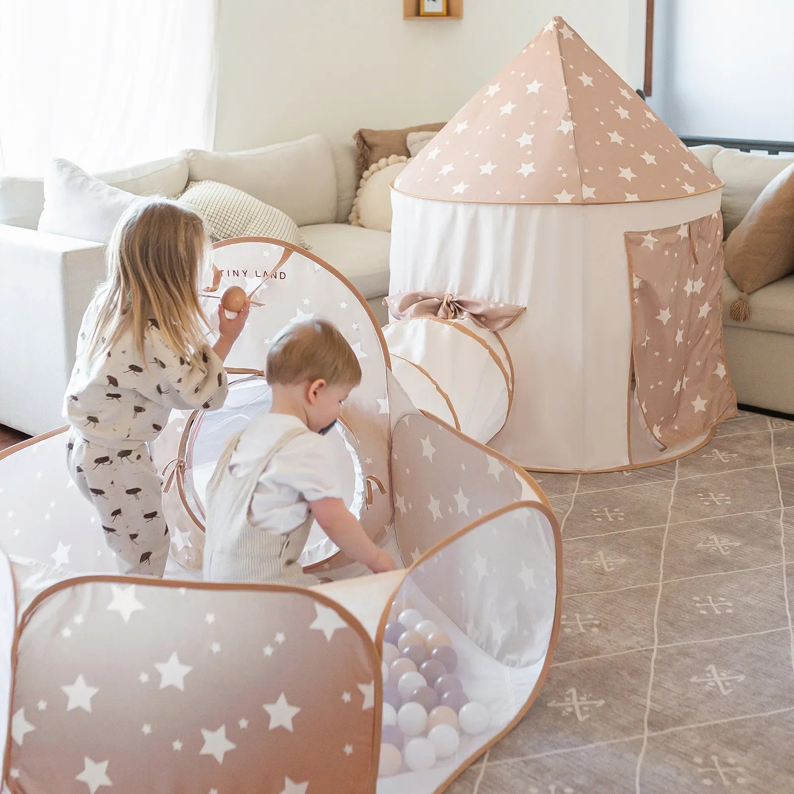 Tiny Land Compact Adventure 3-in-1 Play Tunnel pink star-pattern fabric with tunnels on Tampa Home & Garden Store