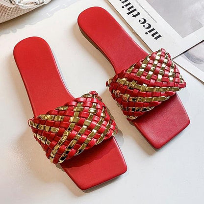 Pair of red braided strap flat sandals for women with gold accents open-toe slip-ons on Tampa Home & Garden Store