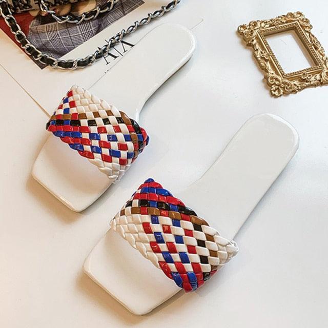 Stevvex open-toe flat sandals with multicolor woven strap on white base pair on Tampa Home & Garden Store