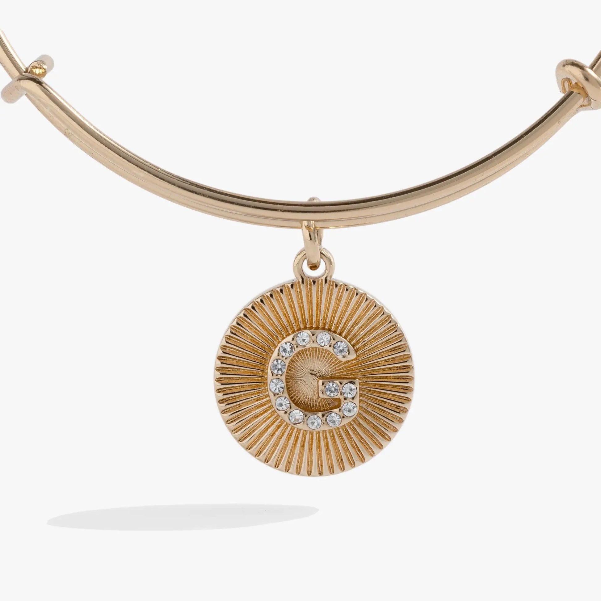 Initial G pave starburst texture bangle bracelet by Alex and Ani, gold-tone with crystal sunburst pendant on Tampa Home & Garden Store