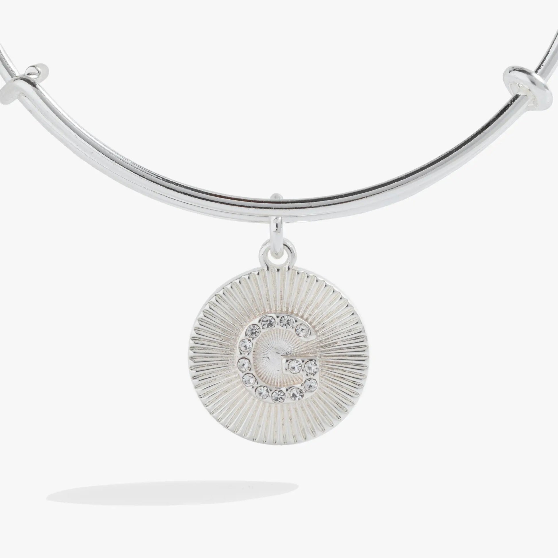 Initial G pave starburst texture bangle with sunburst pendant in silver tone on Tampa Home & Garden Store