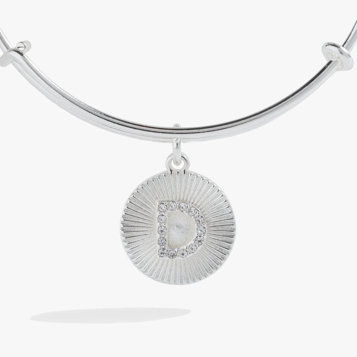 Initial D pave starburst texture bangle, silver Alex and Ani cuff with crystal sunburst pendant on Tampa Home & Garden Store